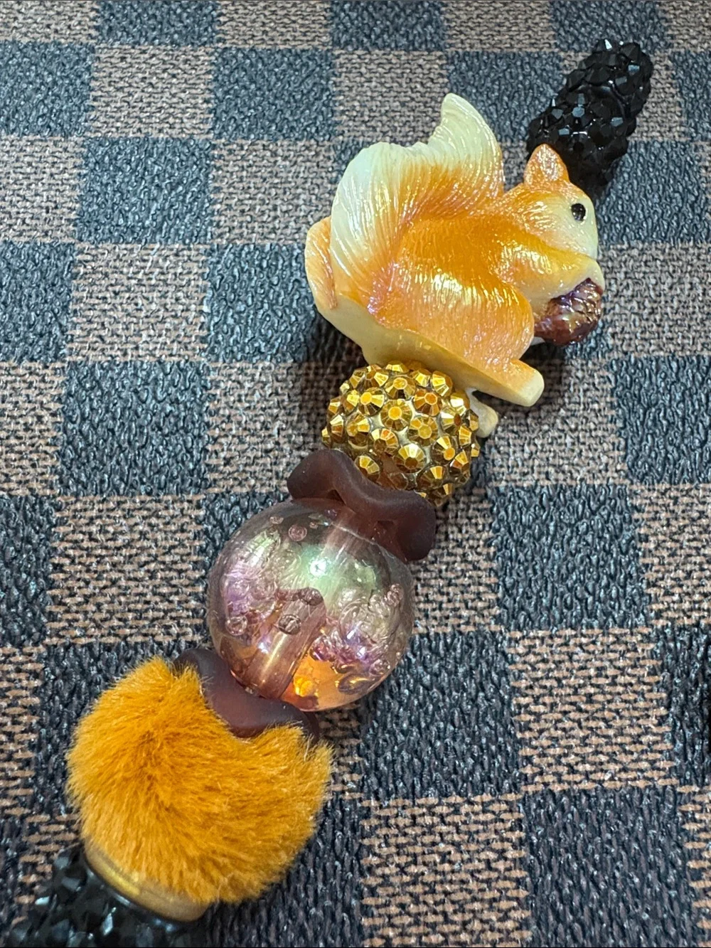 Handcrafted Black Beaded Pen with Orange Squirrel Accent